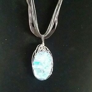 Dichroic wrapped piece on necklace